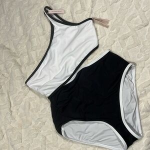 VS one piece. So cute!! Never been worn. Tried on once. Just not my fit.